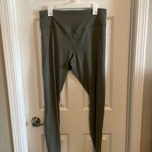 Gaiam green leggings with pockets.
